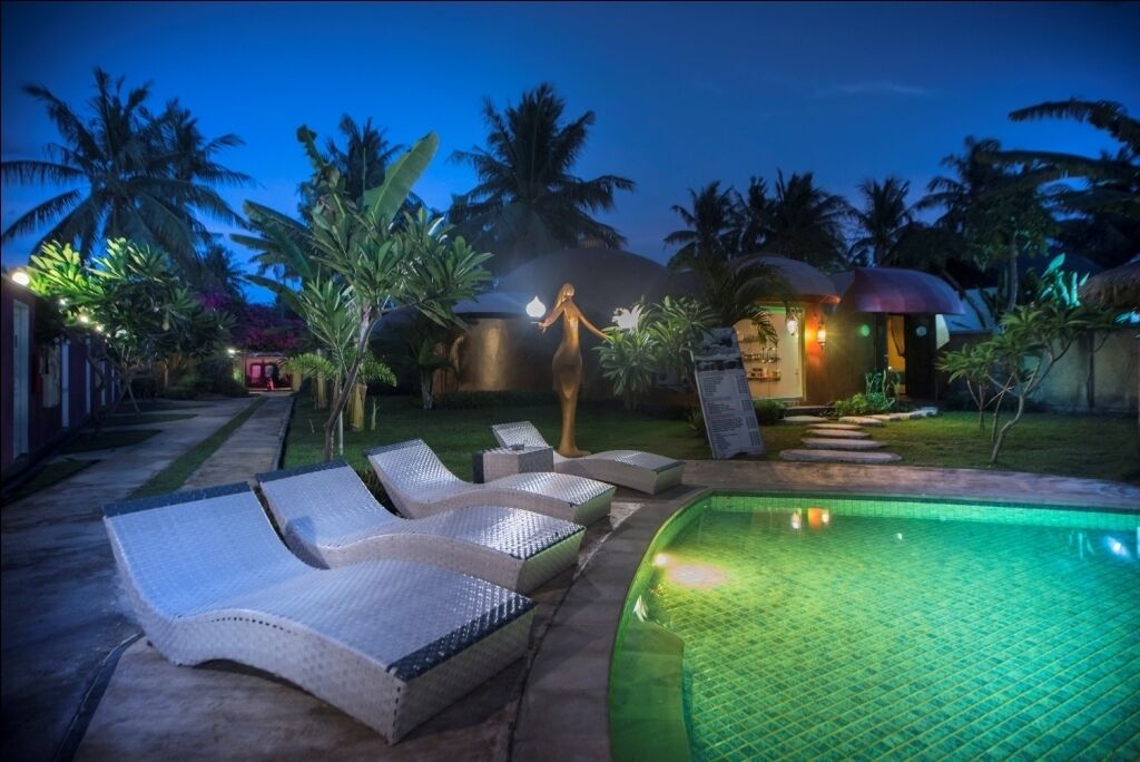 outdoor pool, pool loungers, lifeguards on site