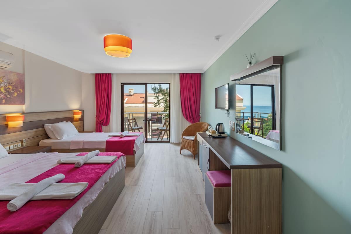 Standard Triple Room, 1 Bedroom, Sea View | Premium bedding, down comforters, minibar, desk