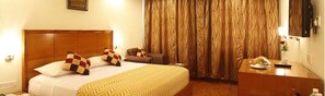 Chambre Deluxe | Mini-bar avec articles gratuits, bureau, lits pliants/supplémentaires