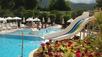 Outdoor pool, open 7 AM to 7 PM, pool umbrellas, sun loungers