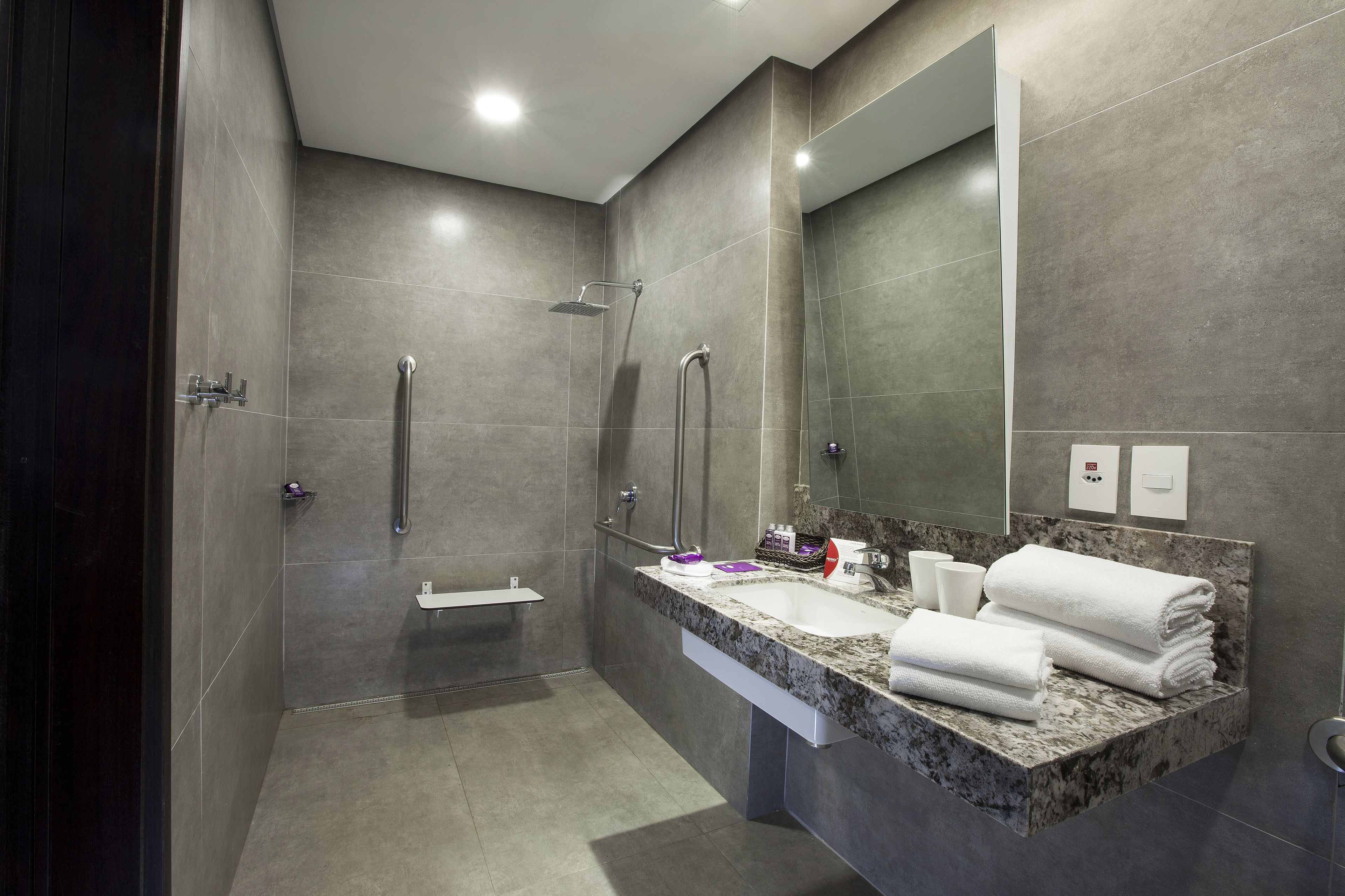 standard double or twin room, accessible | bathroom | shower, free toiletries, hair dryer, towels