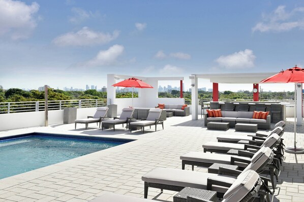 Outdoor pool, free pool cabanas, pool umbrellas