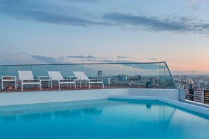 Seasonal outdoor pool, open 9 AM to 7:00 PM, sun loungers