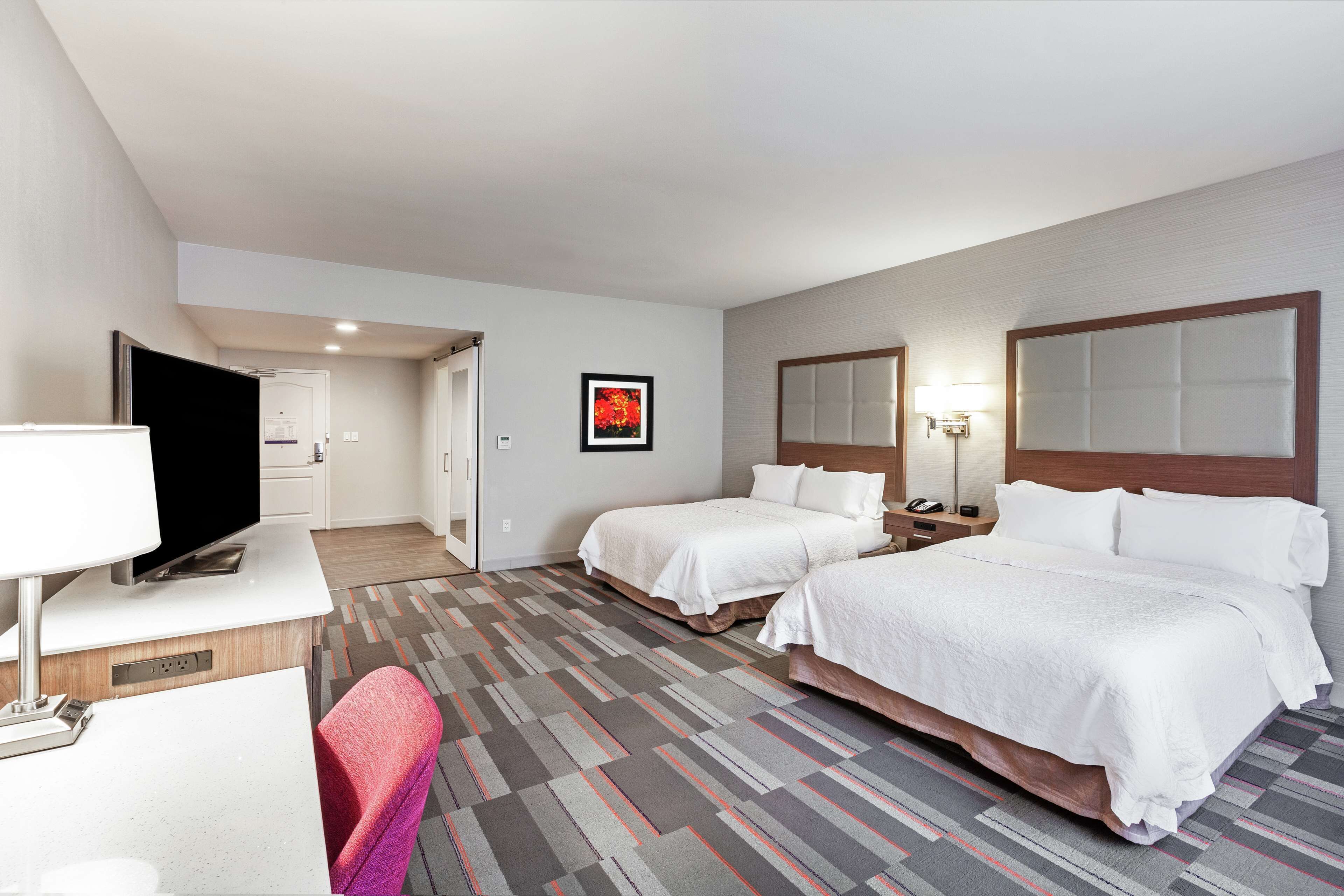 room, 2 queen beds, accessible, bathtub | in-room safe, soundproofing, iron/ironing board, cots/infant beds