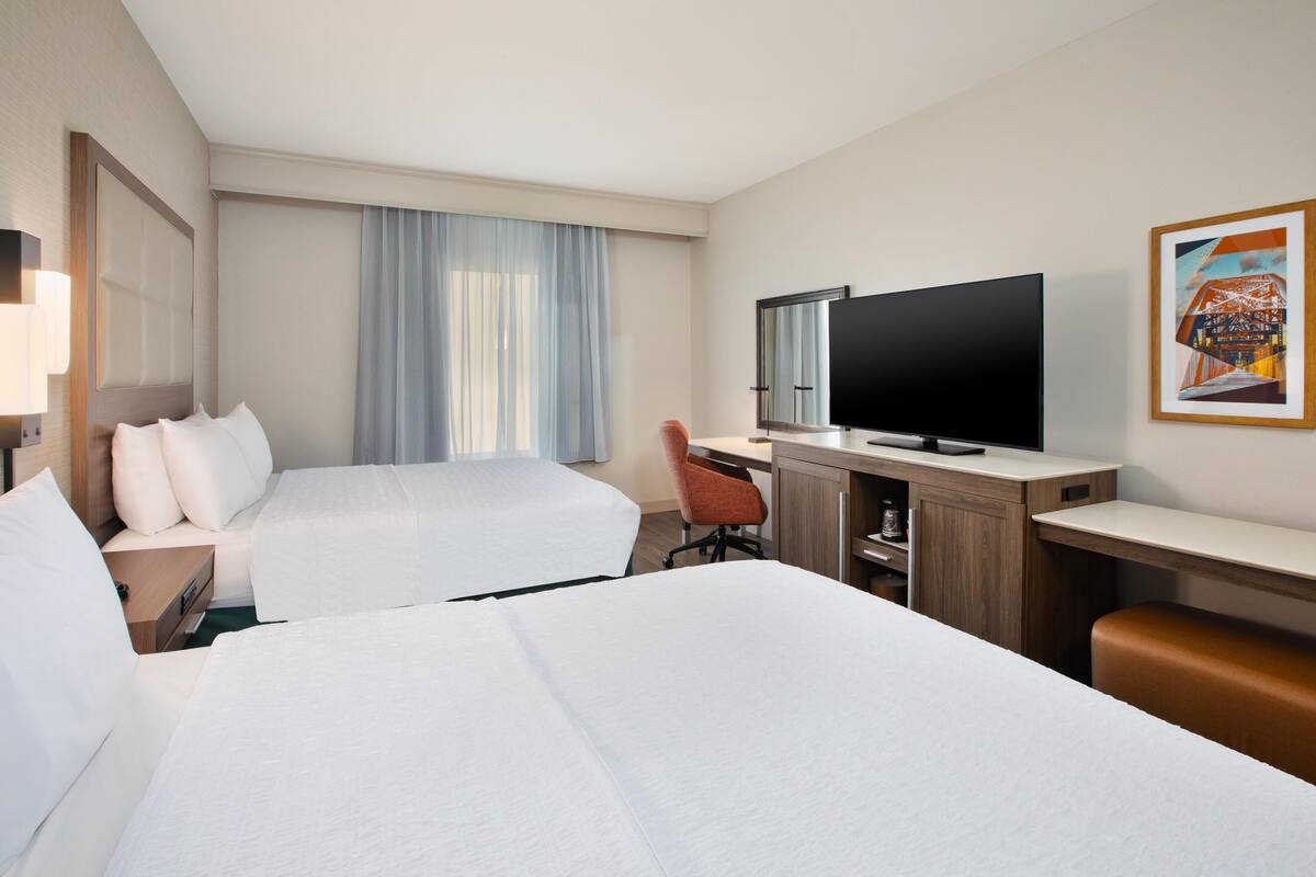 Room, 2 Queen Beds, Accessible | In-room safe, soundproofing, iron/ironing board, cribs/infant beds