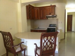 Quadruple Room, Beachfront | Private kitchen - Aparta Hotel Caribe Paraiso (Guayacanes)