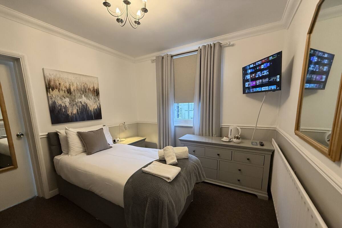 Quarto solteiro conforto, suíte | 1 quarto, individualmente decorados, individualmente mobiliados