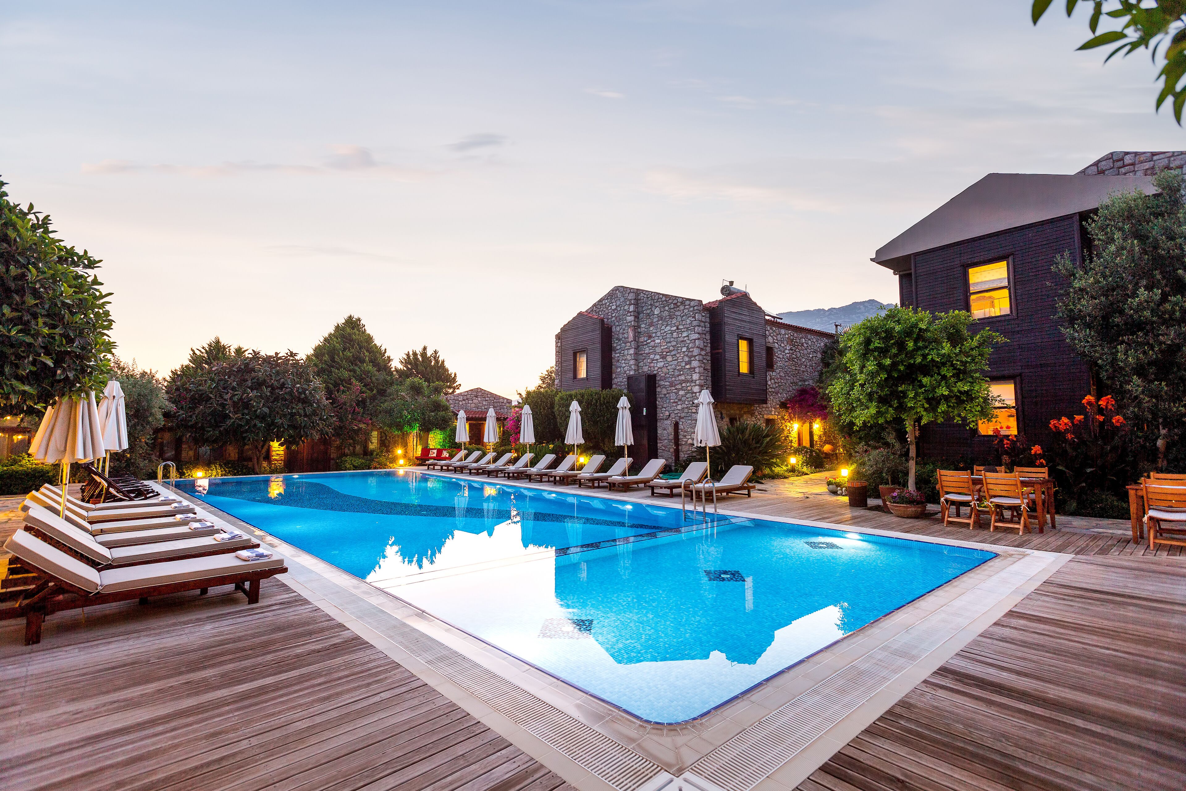 outdoor pool, pool umbrellas, pool loungers