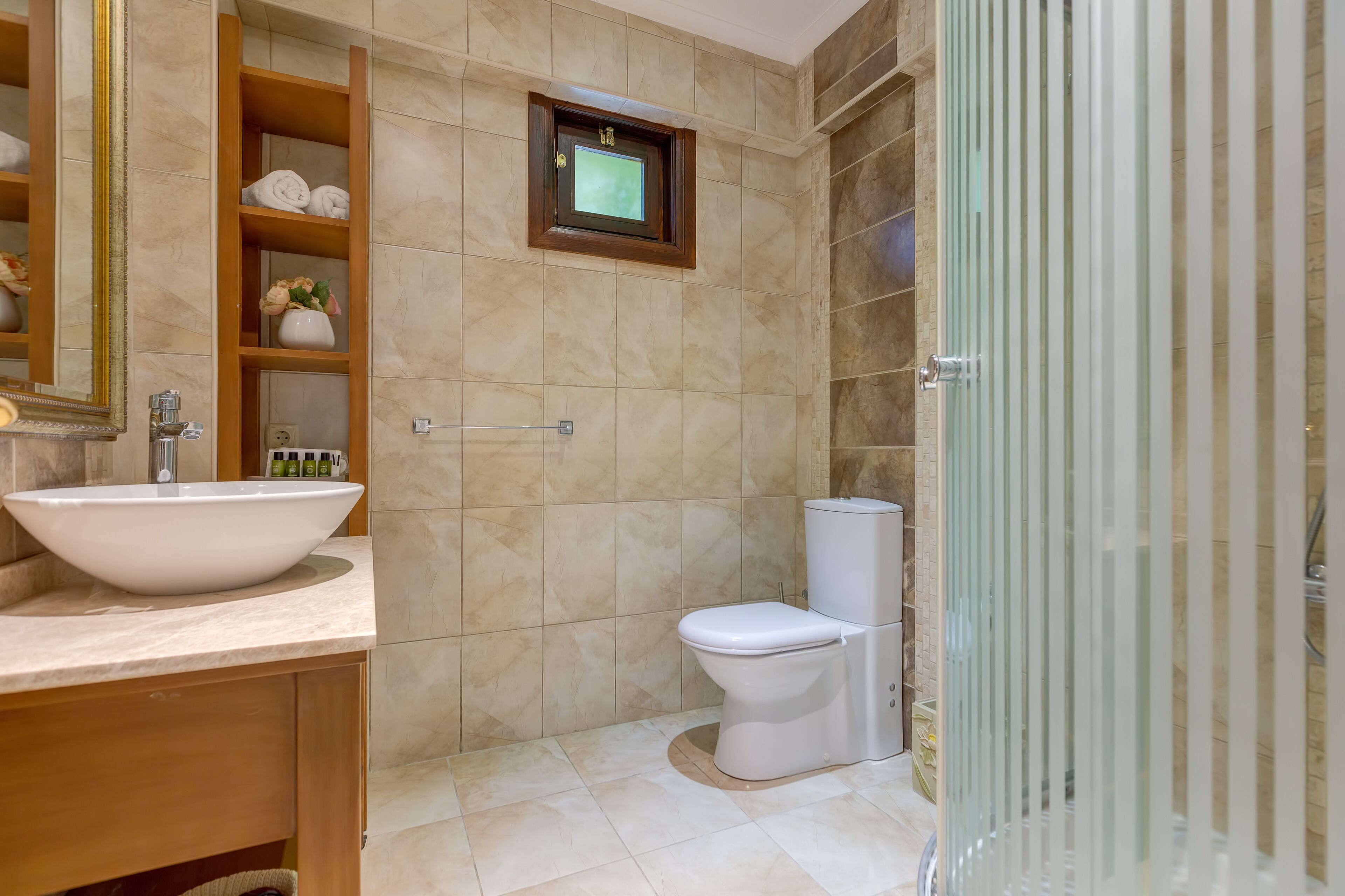 stone room  | bathroom | shower, free toiletries, hair dryer, slippers