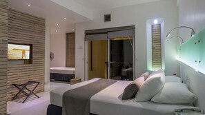 Deluxe Triple Room  Balcony With One Free Head Massage | Minibar, in-room safe, soundproofing, iron/ironing board