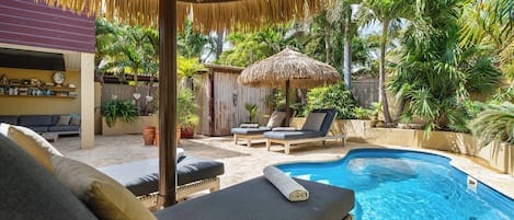 Outdoor pool, pool umbrellas, pool loungers