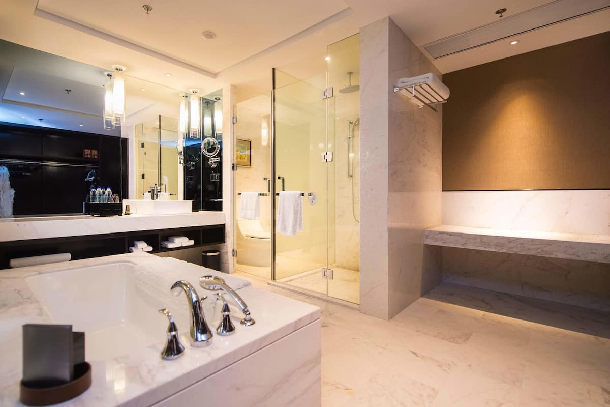 executive suite, 1 bedroom, city view, executive level | bathroom | separate bathtub and shower, deep-soaking bathtub, free toiletries