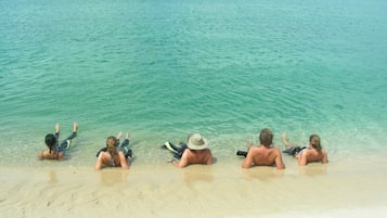 On the beach, white sand, scuba diving, rowing