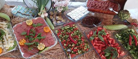 A variety of food items and condiments arranged on a table.