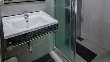 Superior Room, 1 King Bed | Bathroom | Shower, hair dryer, towels, soap