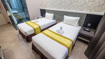 Kamar Superior, 2 Tempat Tidur Twin | Brankas, meja kerja, setrika/meja setrika, dan Wi-Fi gratis