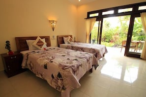 Habitación superior | Escritorio, camas extra y wifi gratis 