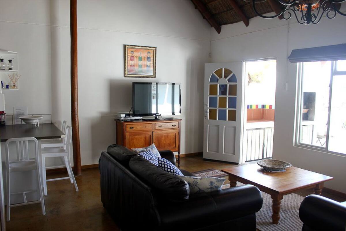 Télévision à écran plat de 106 cm avec chaînes par satellite