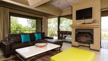 42-inch TV with satellite channels, fireplace