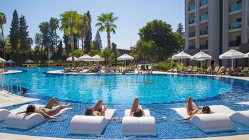 Indoor pool, 6 outdoor pools, open 8:00 AM to 7:00 PM, pool umbrellas