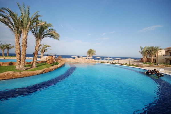 2 outdoor pools, pool umbrellas, sun loungers