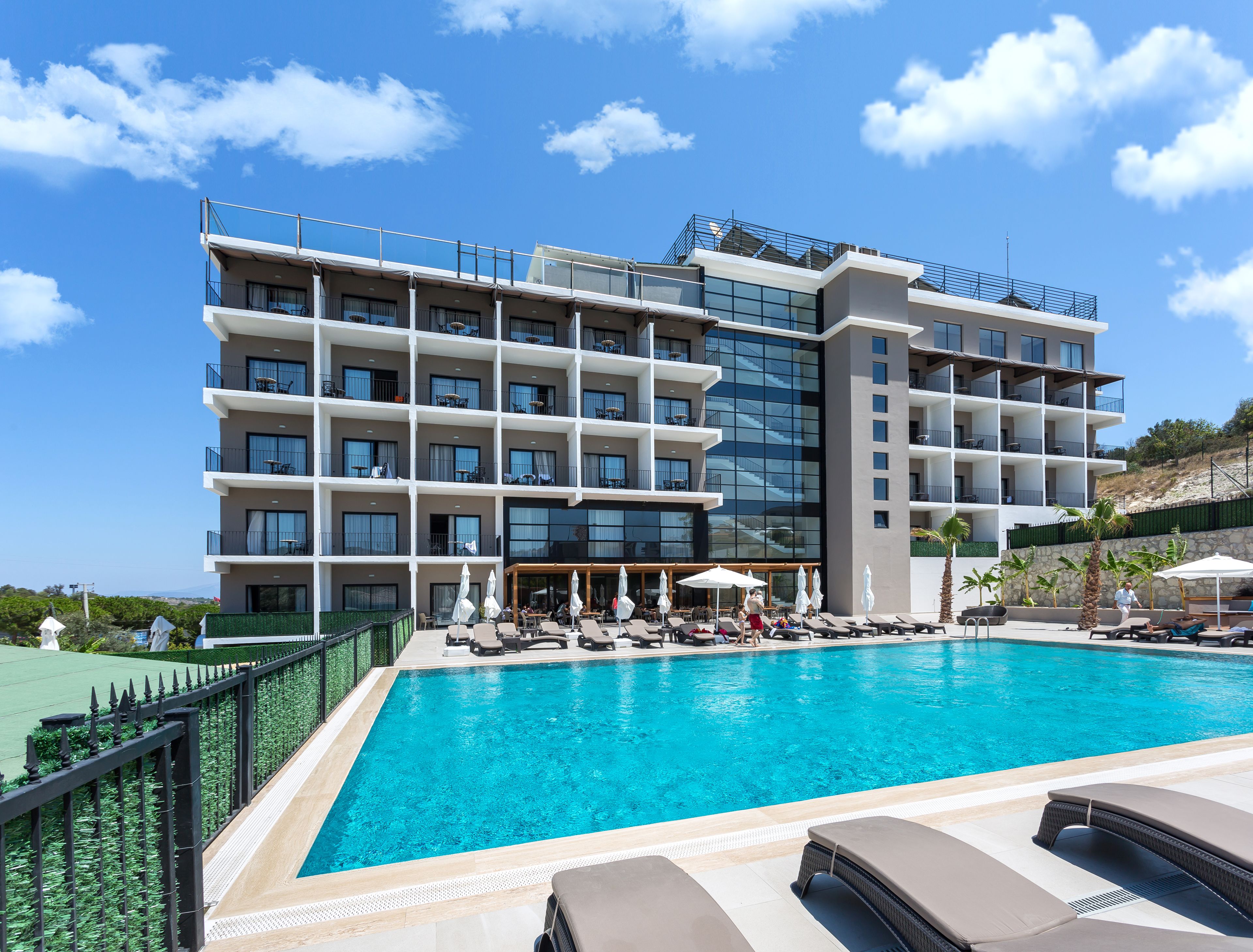 outdoor pool, pool umbrellas, pool loungers