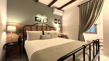 Suite familiar, 2 habitaciones, balcón | Ropa de cama de alta calidad y artículos del minibar gratis