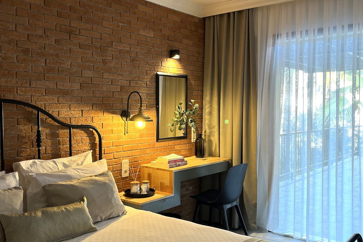 deluxe double room, 1 bedroom, terrace | 2 bedrooms, premium bedding, free minibar, laptop workspace