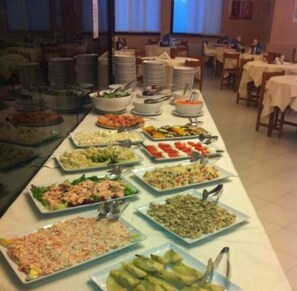 Breakfast, lunch, dinner served; local cuisine