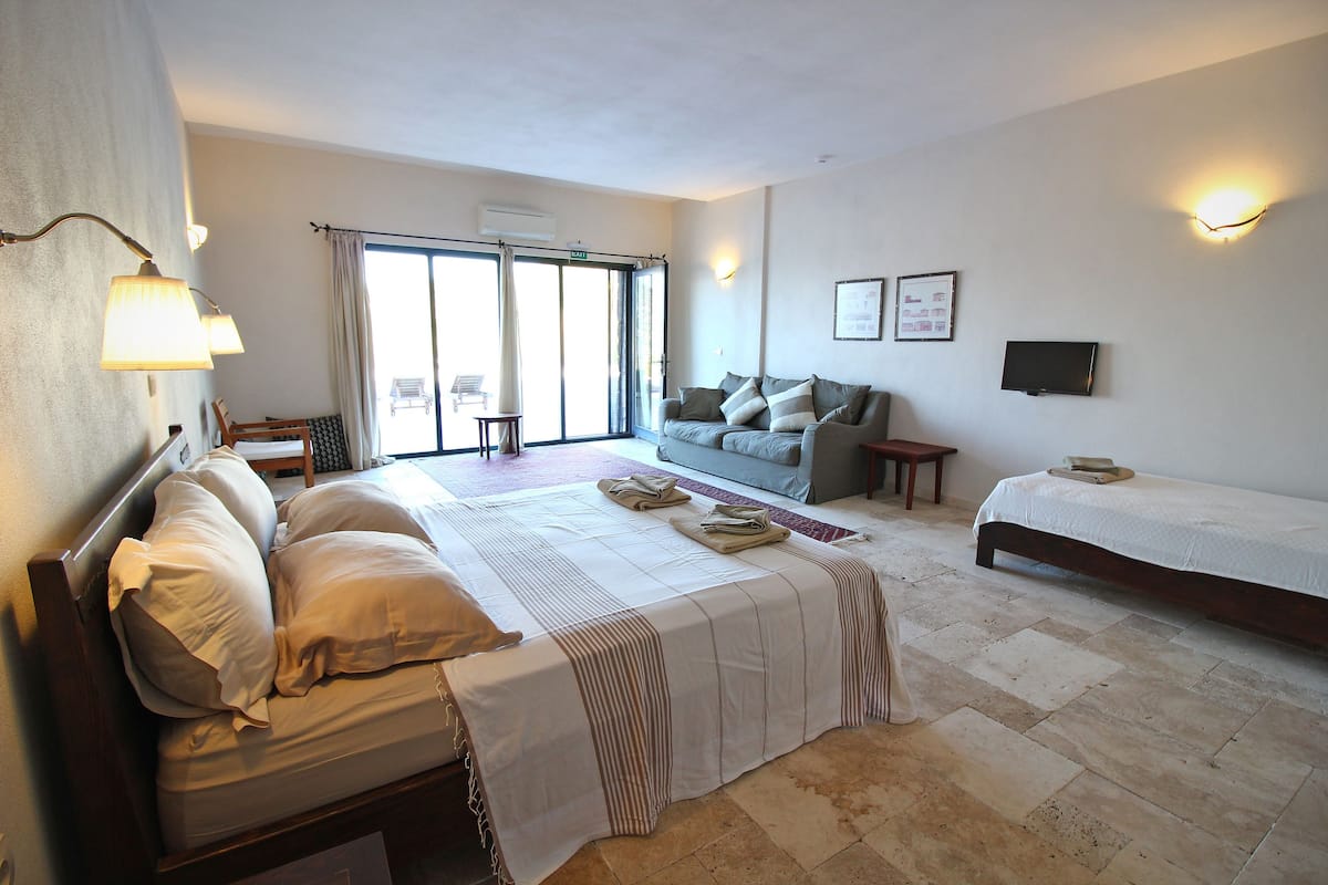 Family Triple Room | Minibar, free WiFi, bed sheets