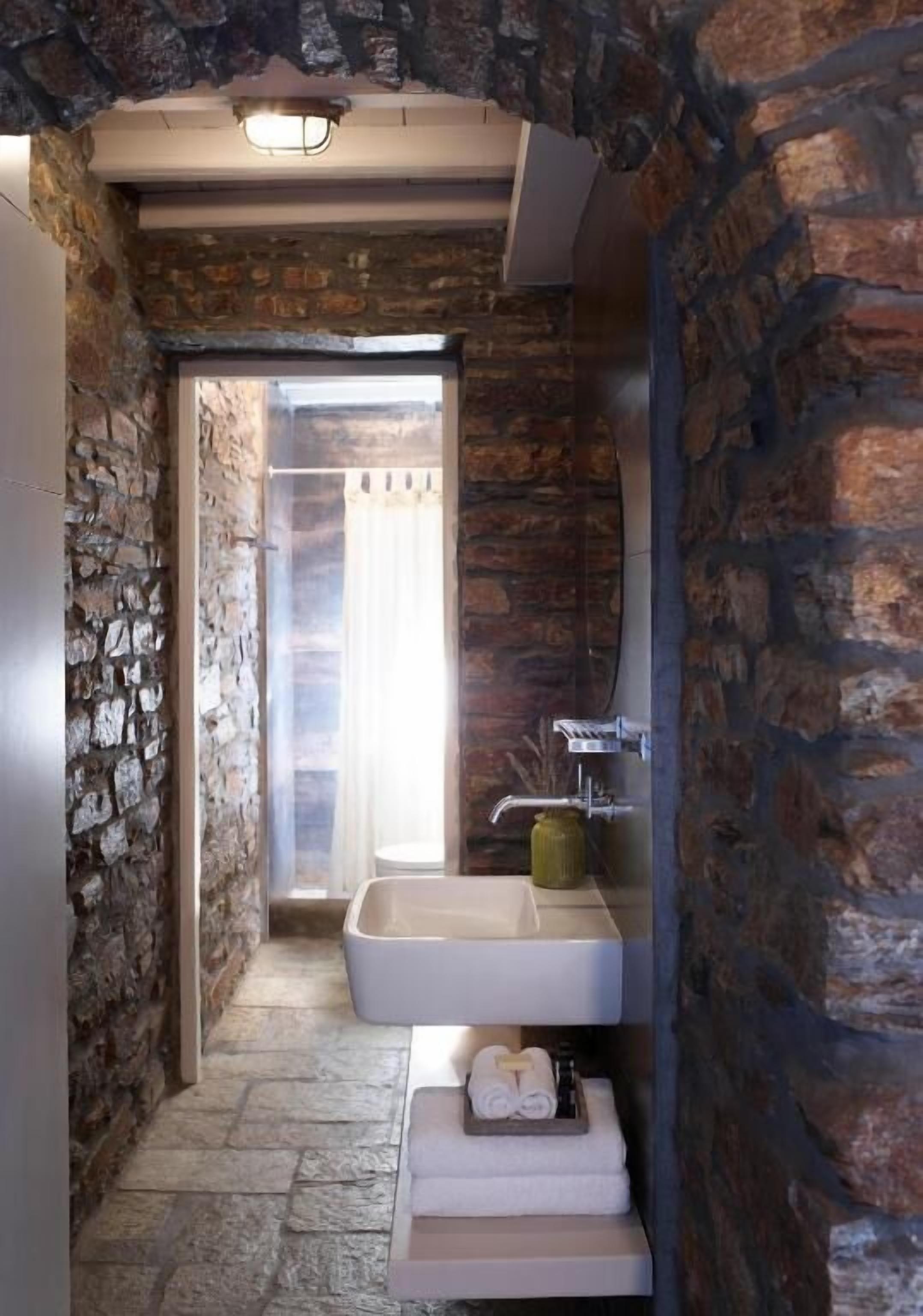 deluxe suite, sea view | bathroom | shower, rainfall showerhead, designer toiletries, hair dryer