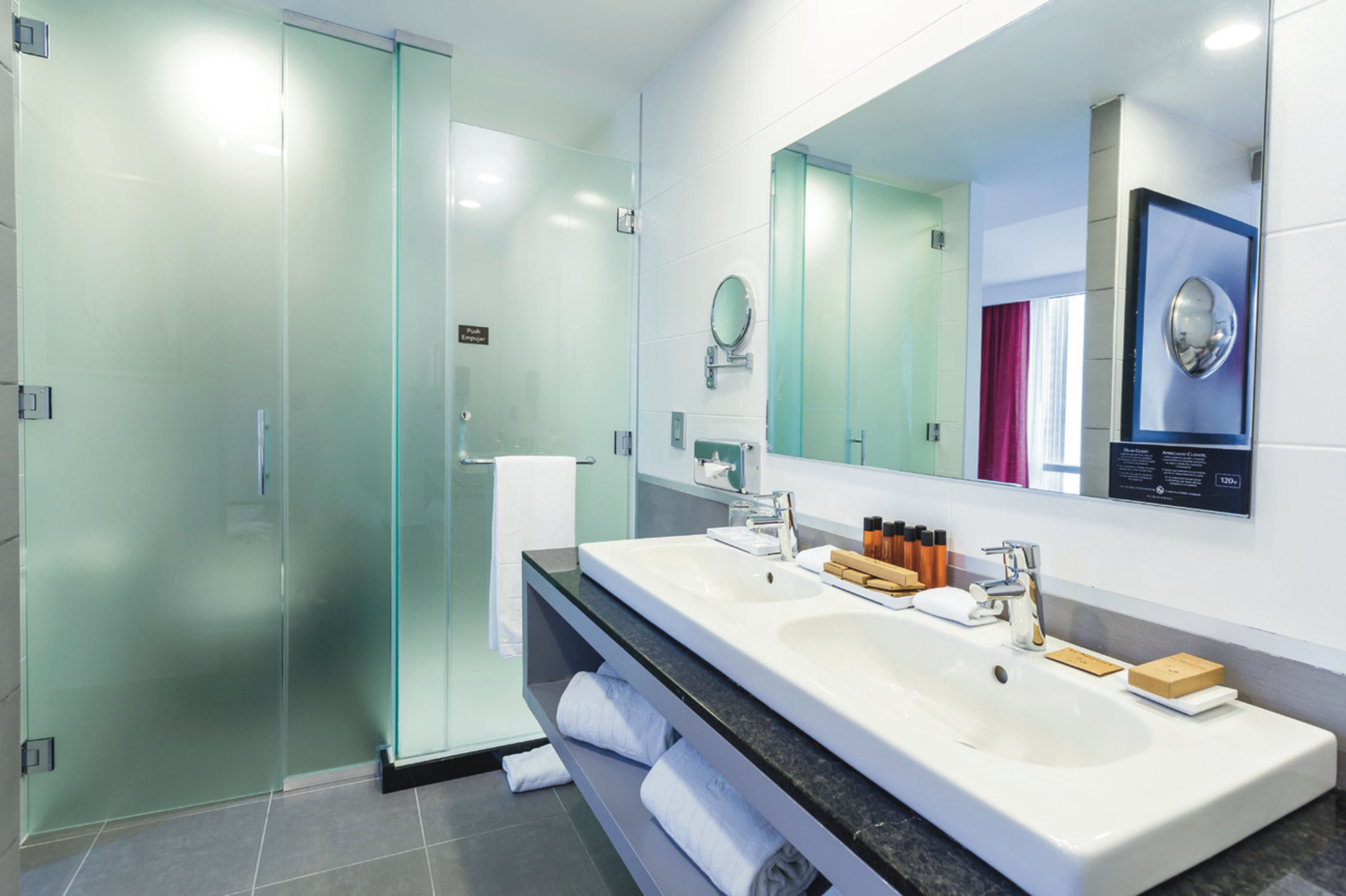 eco-friendly toiletries, hair dryer, towels