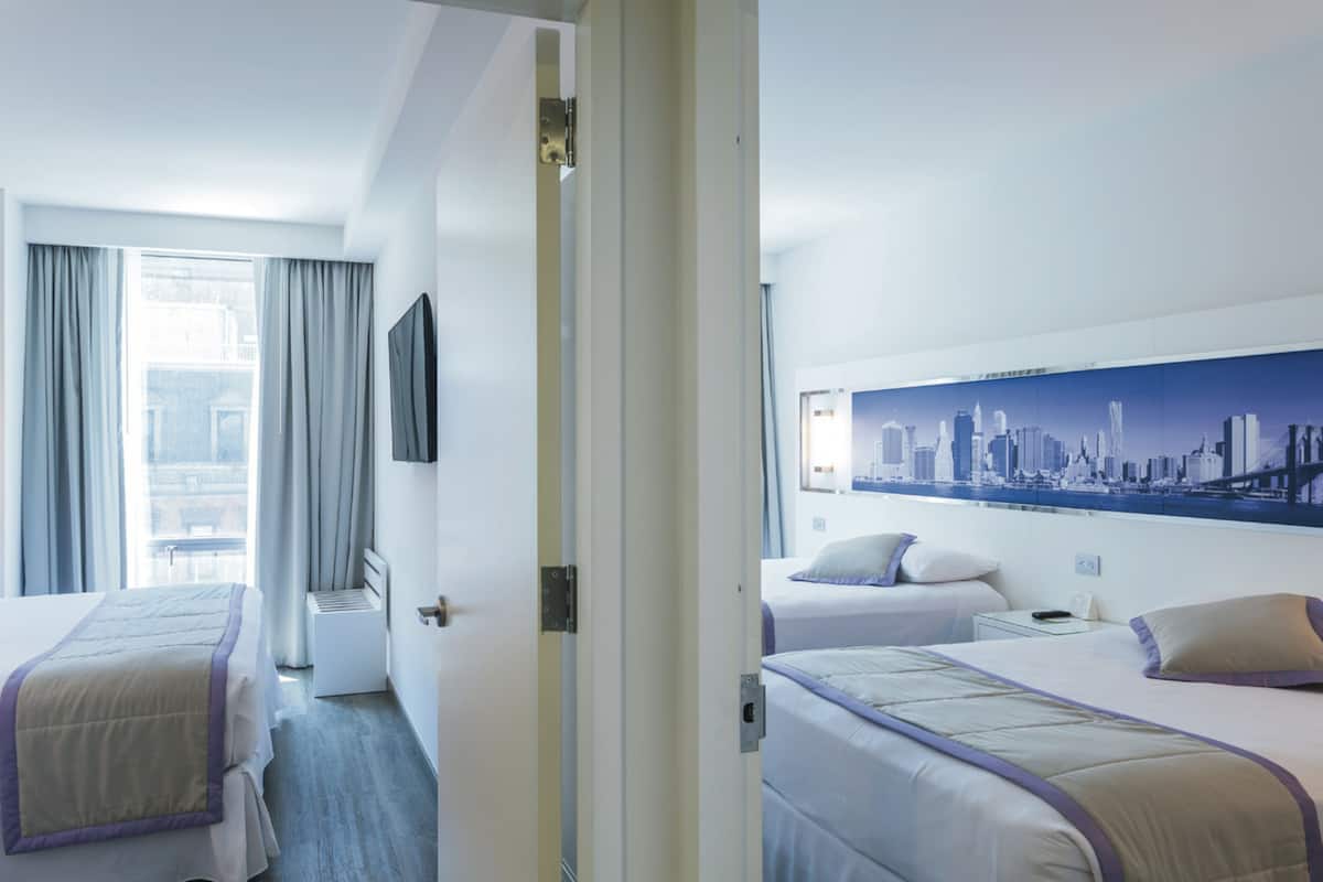Family Suite | 1 bedroom, in-room safe, desk, iron/ironing board