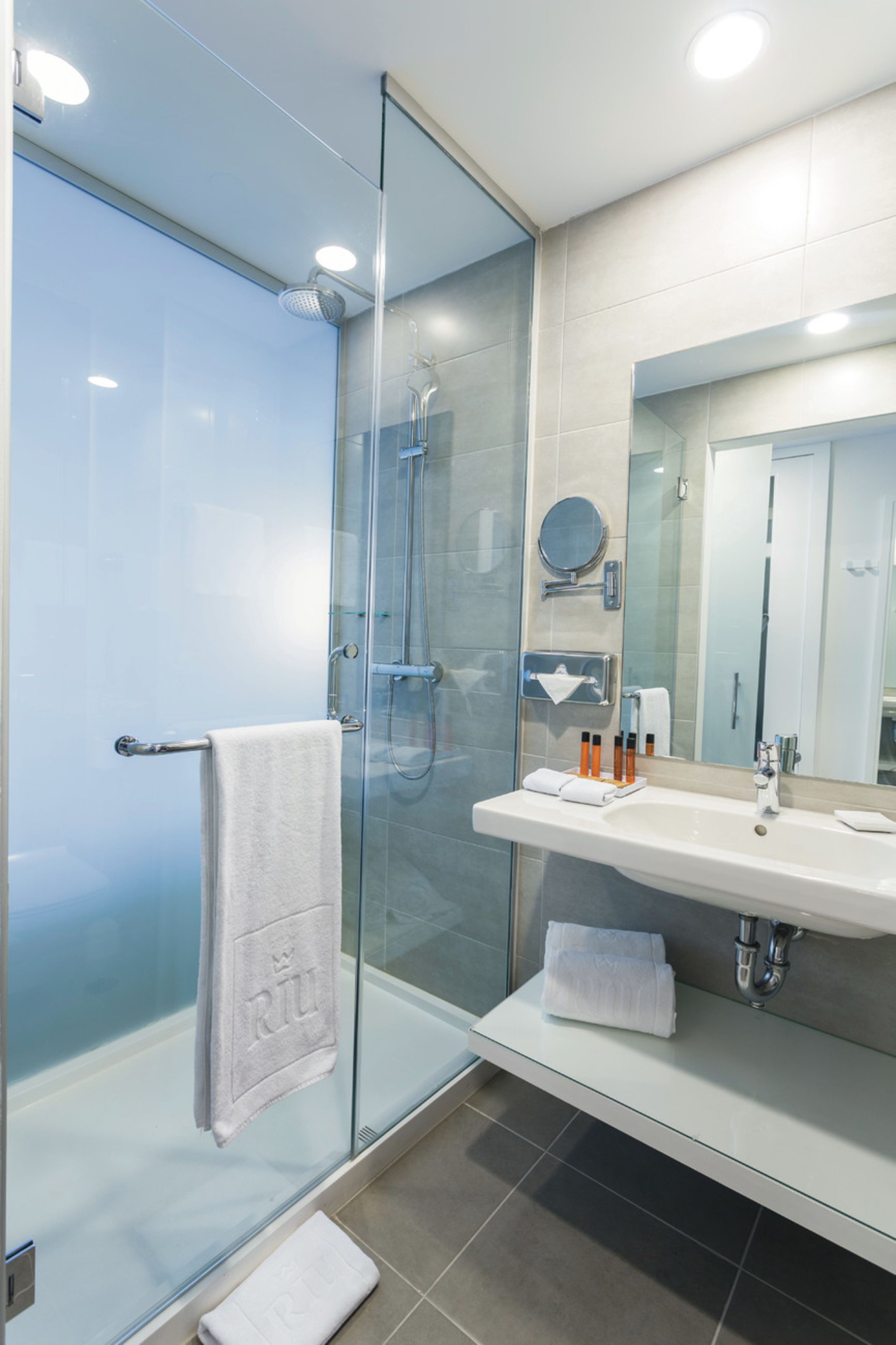 eco-friendly toiletries, hair dryer, towels