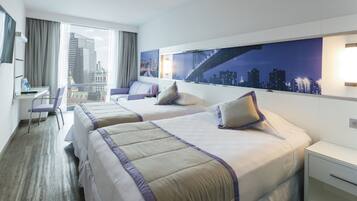 Deluxe Room, Multiple Beds | In-room safe, desk, iron/ironing board, free cribs/infant beds