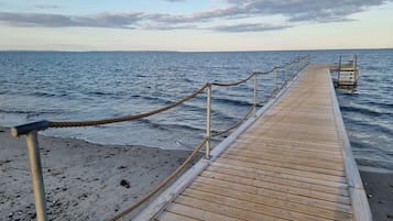 Private beach nearby, white sand