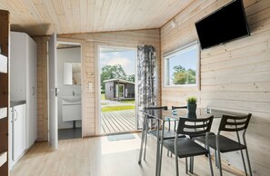 Standard Cabin, Private Toilet, Shared Bathroom (Linen Excluded)  | Cribs/infant beds - First Camp Ajstrup Strand (Malling)