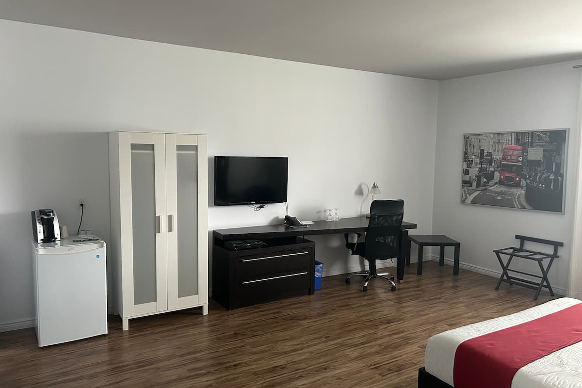 desk, blackout curtains, soundproofing, iron/ironing board