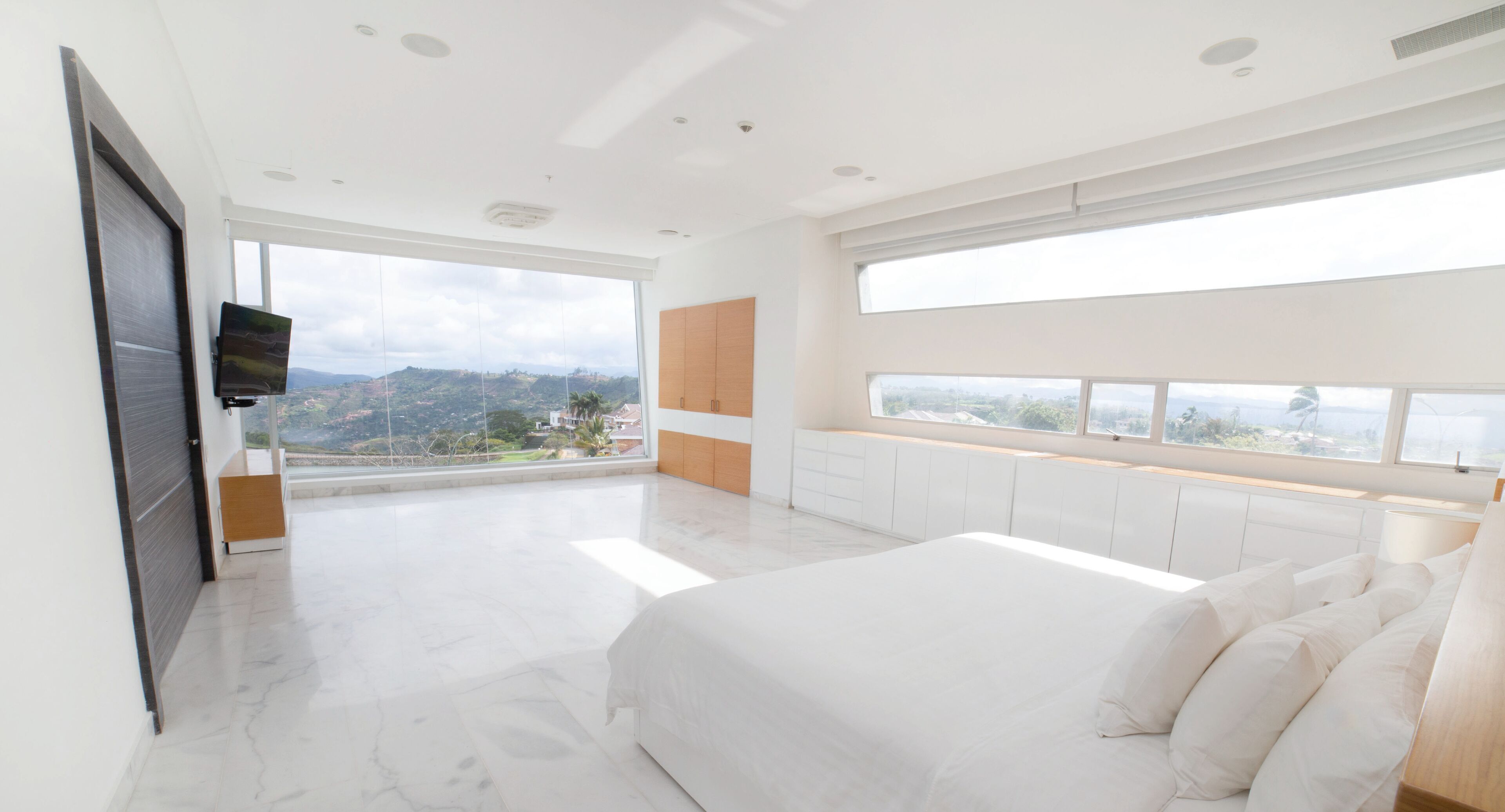 Premium bedding, down duvets, memory-foam beds, in-room safe