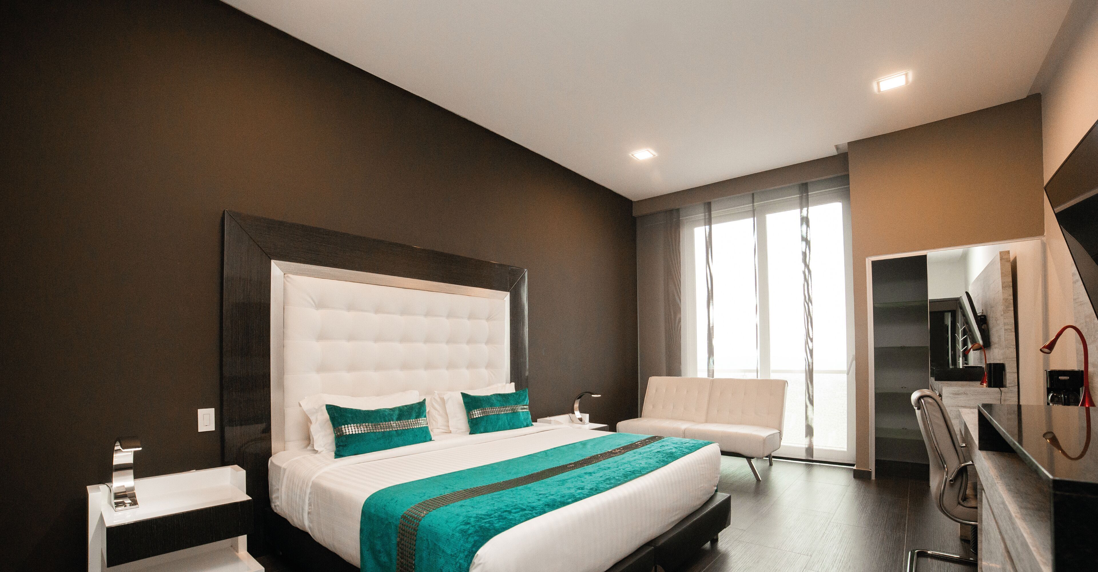Premium bedding, down duvets, memory-foam beds, in-room safe