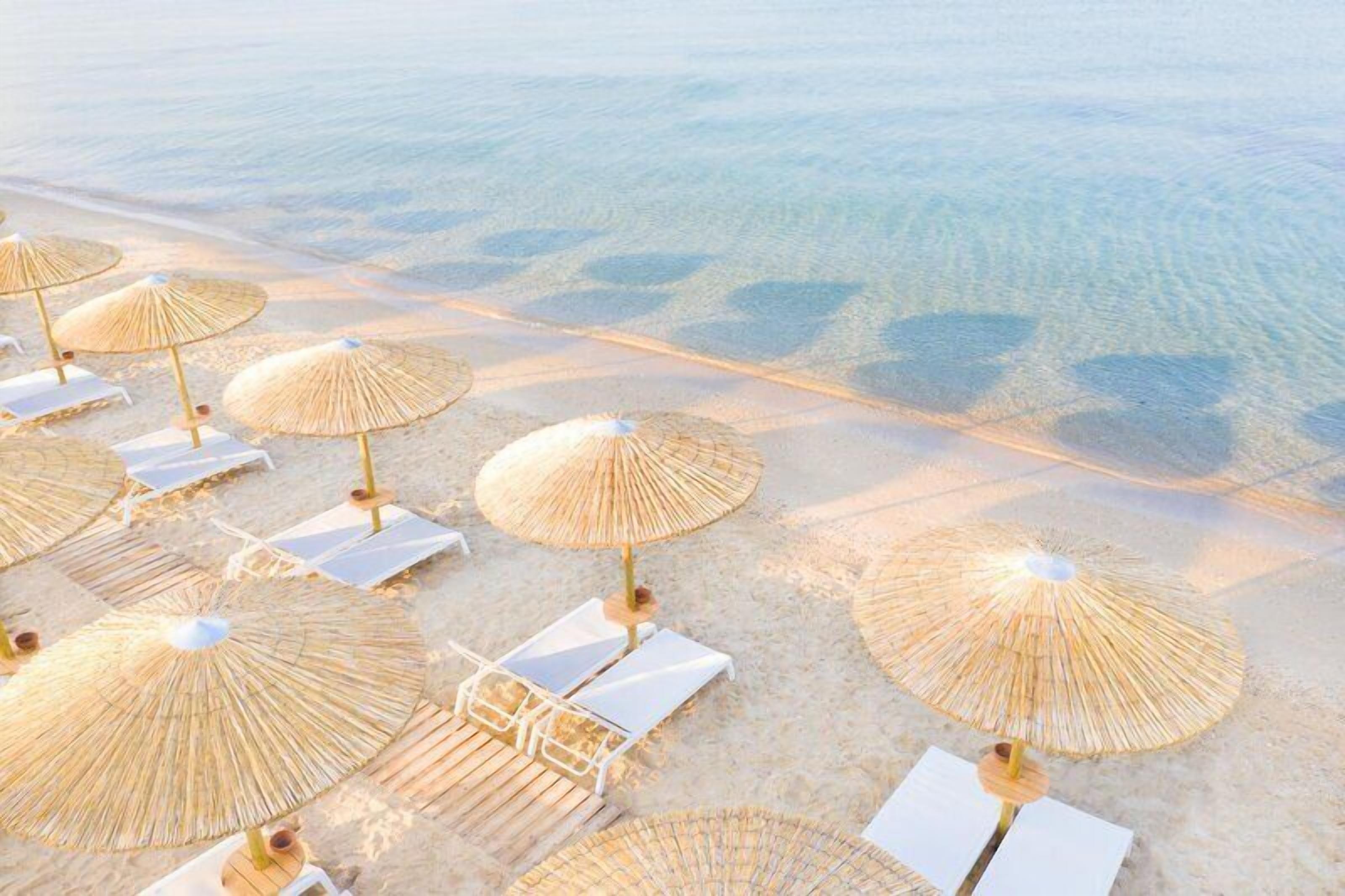 On the beach, beach cabanas, sun-loungers, beach umbrellas