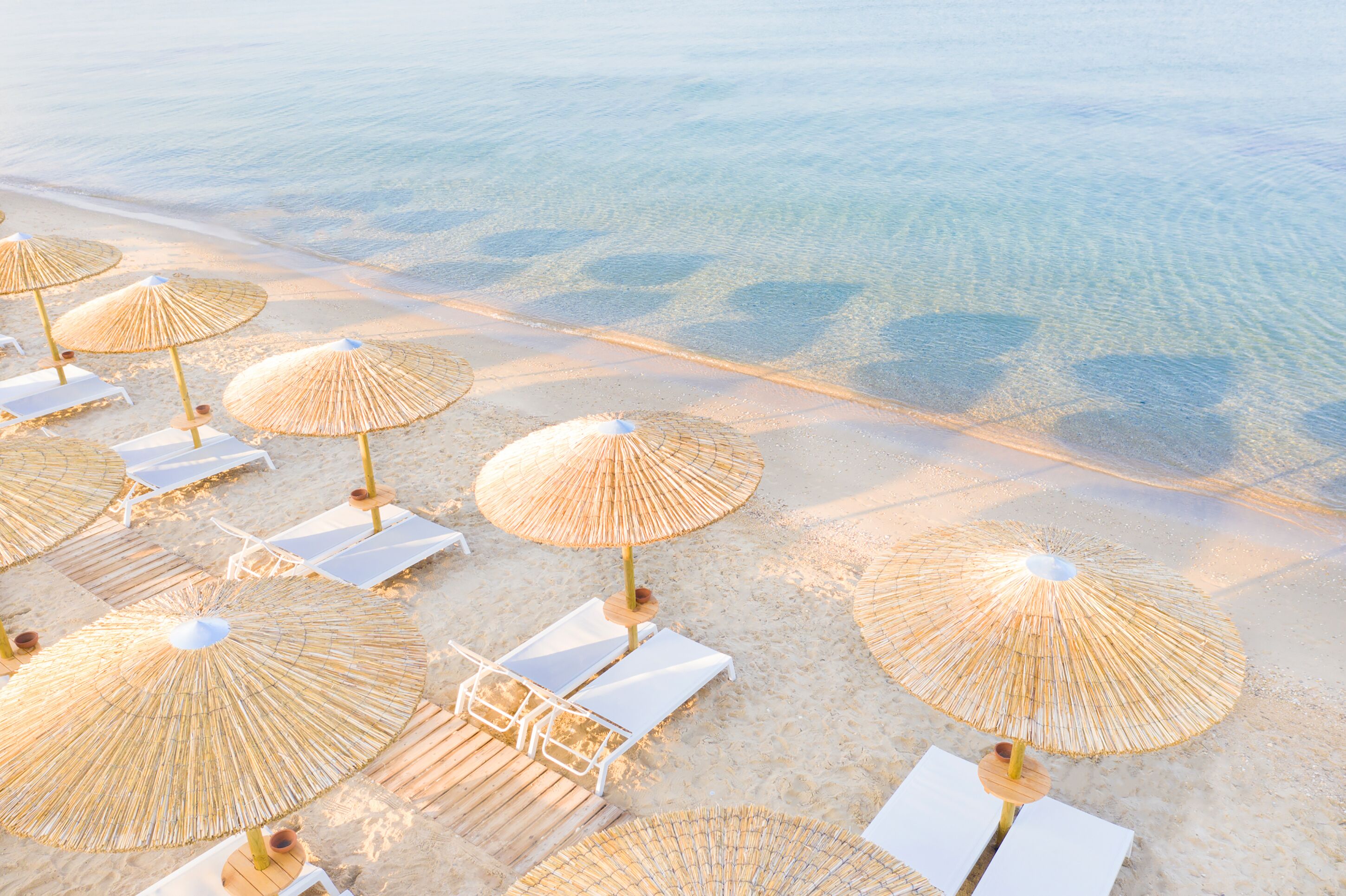 On the beach, beach cabanas, sun-loungers, beach umbrellas