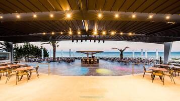 2 bars/lounges, poolside bar, beach bar