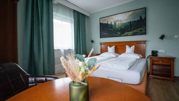 Ropa de cama de alta calidad y minibar