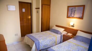 Double or Twin Room | Minibar, in-room safe, desk, blackout drapes