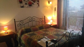 Triple Room, Non Smoking, City View | Desk, free WiFi