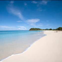 On the beach, white sand, free beach cabanas, sun-loungers