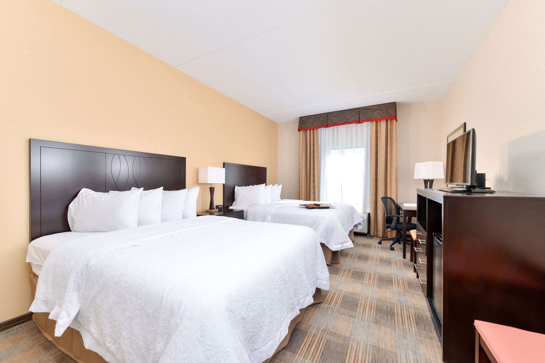 Hypo-allergenic bedding, in-room safe, blackout drapes