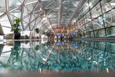 Indoor pool, sun loungers. Oryx Airport Hotel