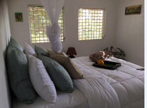 ChaumiĂšre, 2 chambres, 2 salles de bains, vue sur lâocĂ©an | 1 chambre, lit dâappoint (gratuit), accĂšs au Wi-Fi (inclus)